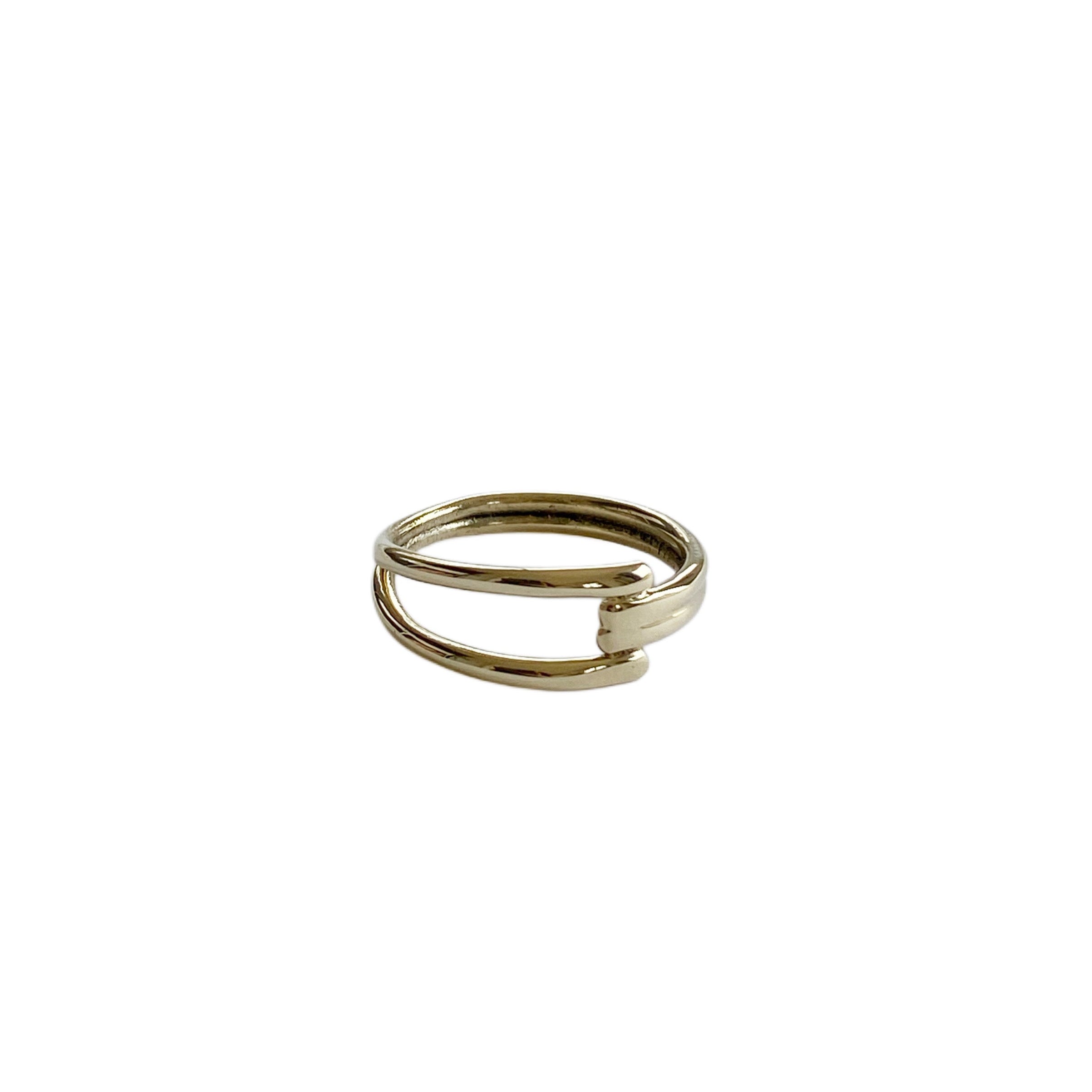 Gold ring on a white background