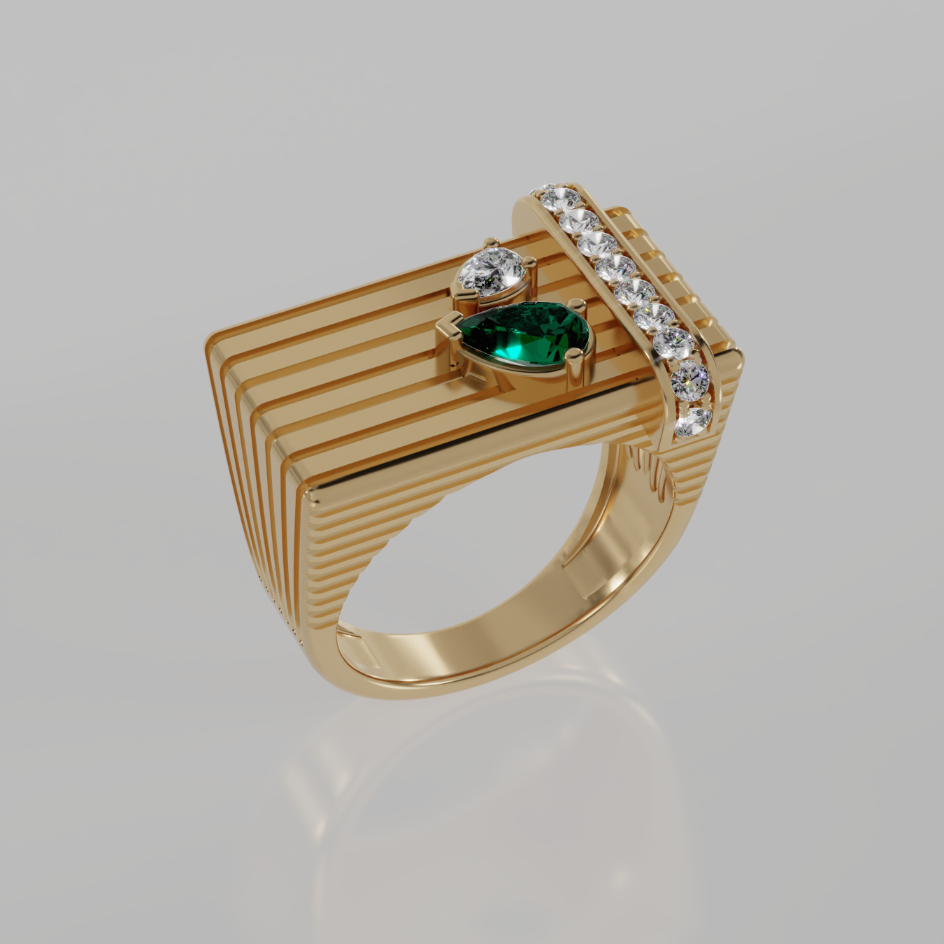 A gold signet ring with a geometric, ribbed rectangular face, featuring two central pear shaped gemstones one emerald and one diamond and a curved row of clear stones along the top, set against a light gray background.